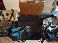 Overview of six assorted bags on table