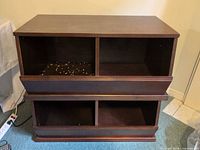 Front view shows entire two-tier unit with four cubbies