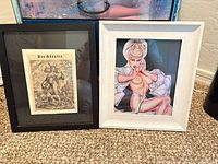 Front view of both framed prints side by side