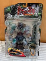 Front view sealed figure in clamshell package