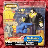 Front view of sealed John Lennon Yellow Submarine action figure package