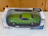 Front angled view of boxed Maisto 1968 Camaro model