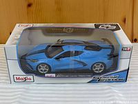 Front angled view of boxed Maisto Corvette model