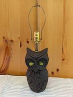 Full view of pottery owl lamp base showing socket and neck