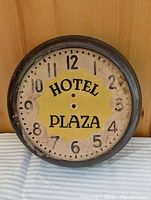 Front view showing full clock face and missing hands
