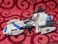 Angled top-side view showing full speeder profile, colours and decals