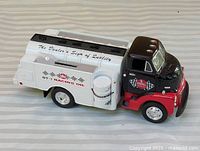 Front left view of die-cast Kendell tanker bank truck