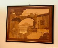 Front view of wood marquetry panel showing full landscape scene and border