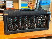 Front view of Yorkville MP6 mixer showing six input channels, EQ section, and controls
