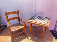 Armchair and chess table side by side