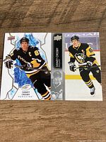 Both Sidney Crosby Upper Deck hockey cards front view