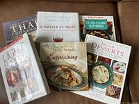 Front view of six cookbooks showing titles and covers