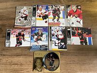 Overview of all nine Ottawa Senators trading cards laid out on table