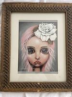 Full view of framed signed print with mat and ornate frame