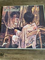 Front cover of Linda Ronstadt Simple Dreams album showing artwork and sleeve condition
