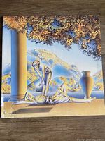Front cover of The Moody Blues "The Present" vinyl LP in sleeve
