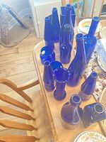 overhead view of entire grouping of cobalt blue glass pieces on table