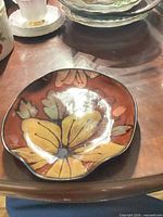 Top view of bowl showing floral design and wavy rim
