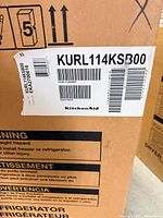 Box label showing model KURL114KSB00 and KitchenAid branding
