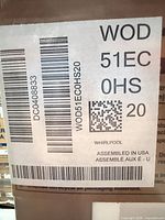 Box label showing model WOD51EC0HS20 and Whirlpool branding