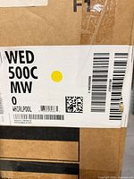 Shipping box showing model label WED500C MW
