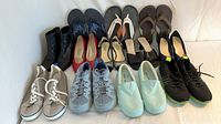 All footwear pairs laid out for overview