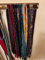 Rack of assorted neckties showing colors and patterns