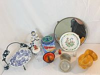 Group shot of entire lot showing all ceramic, glass, metal and mirror pieces