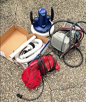 All three main devices with cords and accessories shown together