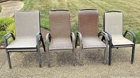 front view of four of the eight sling patio chairs showing frame style and fabric colors
