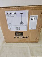 Sealed box showing Feiss label and model P1242AF pendant