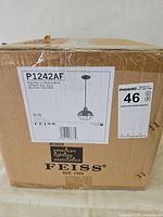 Sealed box with Feiss label showing model P1242AF and product illustration