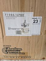 Shipping box with Murray Feiss label showing model F1986/6PBR and bulb requirements