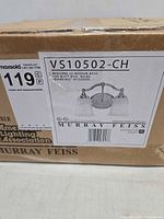 Manufacturer label on shipping box showing model VS10502-CH and fixture illustration