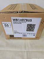 Front of sealed Murray Feiss WB1497BUS carton with product label visible