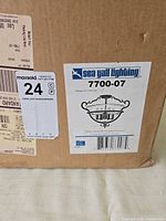 Sealed carton showing manufacturer label and model number
