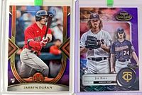 Both rookie cards in protective holders
