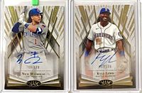 Both autograph cards side by side in holders