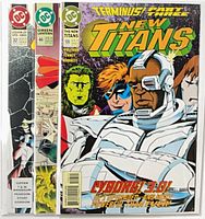 Front view of all three bagged and boarded comics