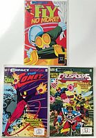 Front covers of all three bagged comics