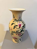 Full view of vase showing floral decoration and shape