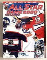 Front cover showing title All-Star Game 2000, jerseys, goalie mask, NHL shield and Nortel Networks logo