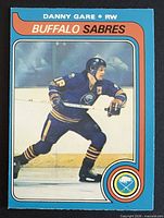 Front of Danny Gare O-Pee-Chee card showing player in action, card number 61