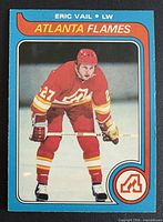 Front of Eric Vail O-Pee-Chee card showing player in red uniform, card design and number