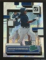Front of Jasson Dominguez 2022 Donruss Rated Prospect Rapture card #RP-2