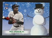 Front of Jazz Chisholm Jr. 2021 Topps Holiday Rookie Relic Card showing player image, snowman graphic, and jersey relic swatch