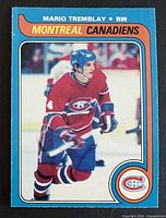 Front of 1979-80 O-Pee-Chee Mario Tremblay card showing action photo, border, team logo