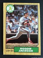 Front of 1987 O-Pee-Chee Reggie Jackson #300 card showing batting image and Oakland Athletics logo