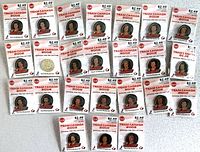 Full lot of 24 sealed pin packages displayed