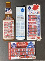 All four Toronto Maple Leafs fridge magnet schedules displayed front side showing season grids and sponsor logos